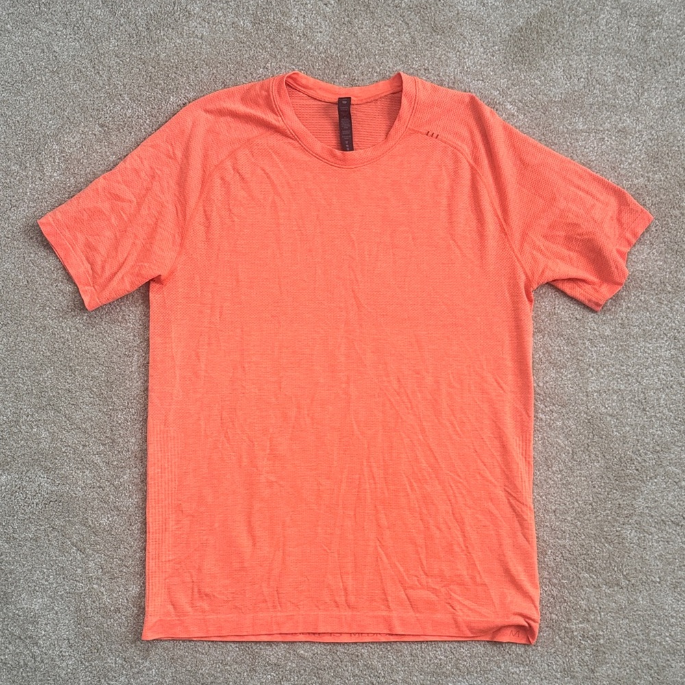 lululemon metal vent orange tee shirt